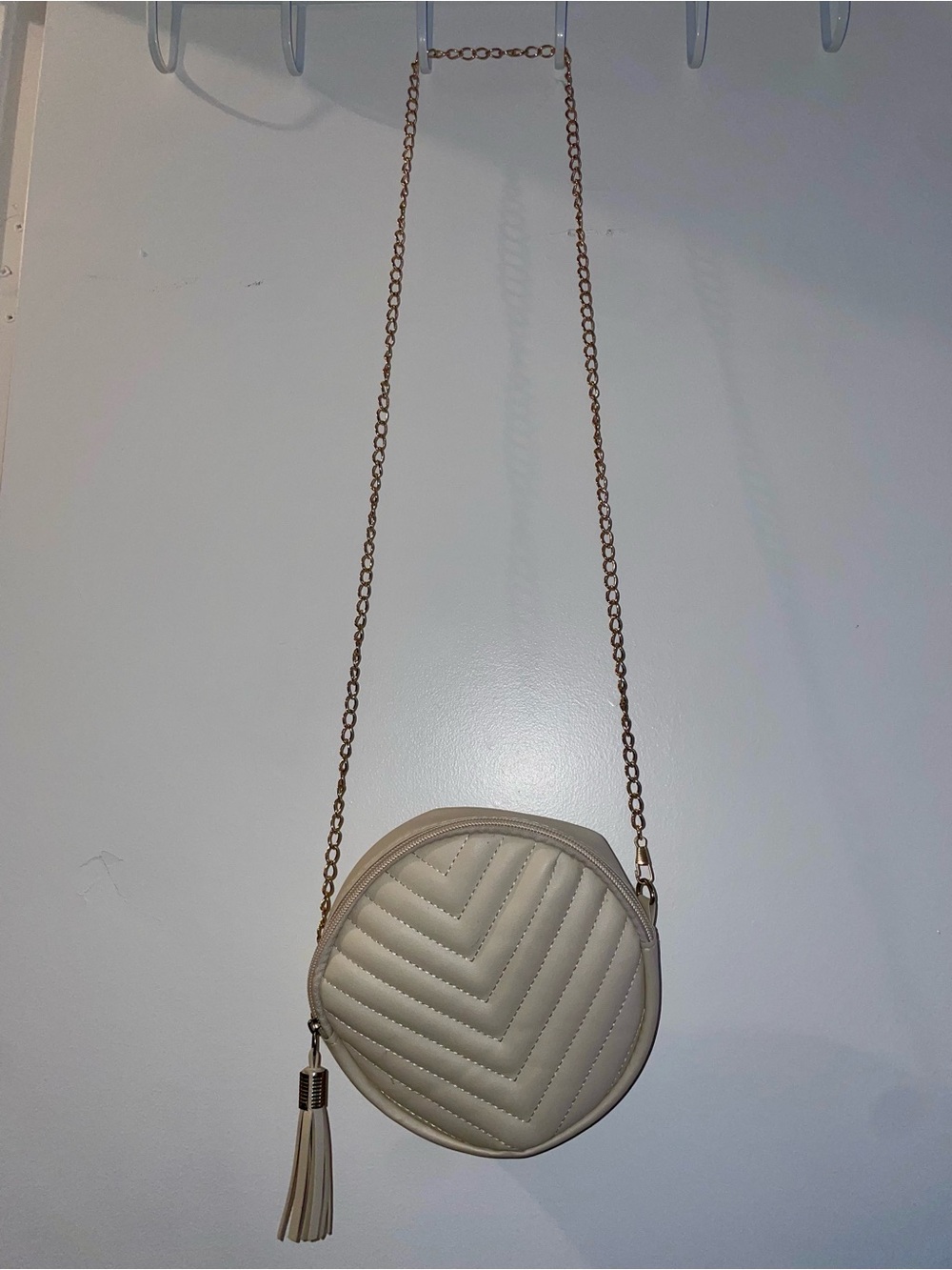 Women's Cream Quilted Round Crossbody Bag with Tassel